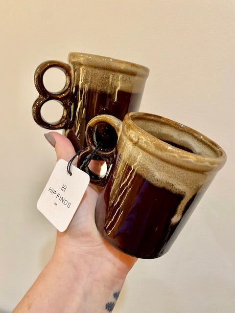 pair of matching two finger handle mugs